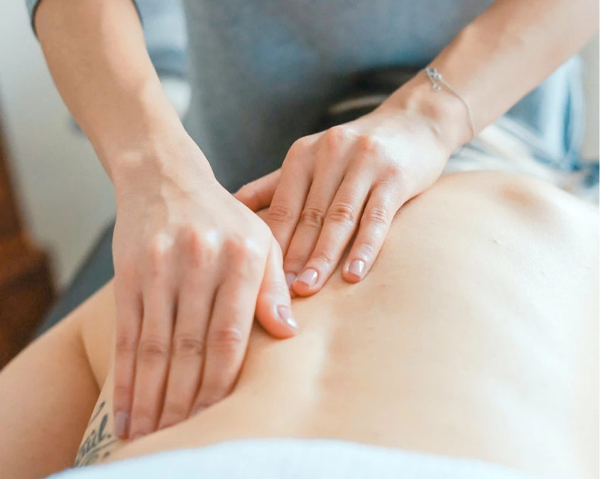 Osteopathic back massage.